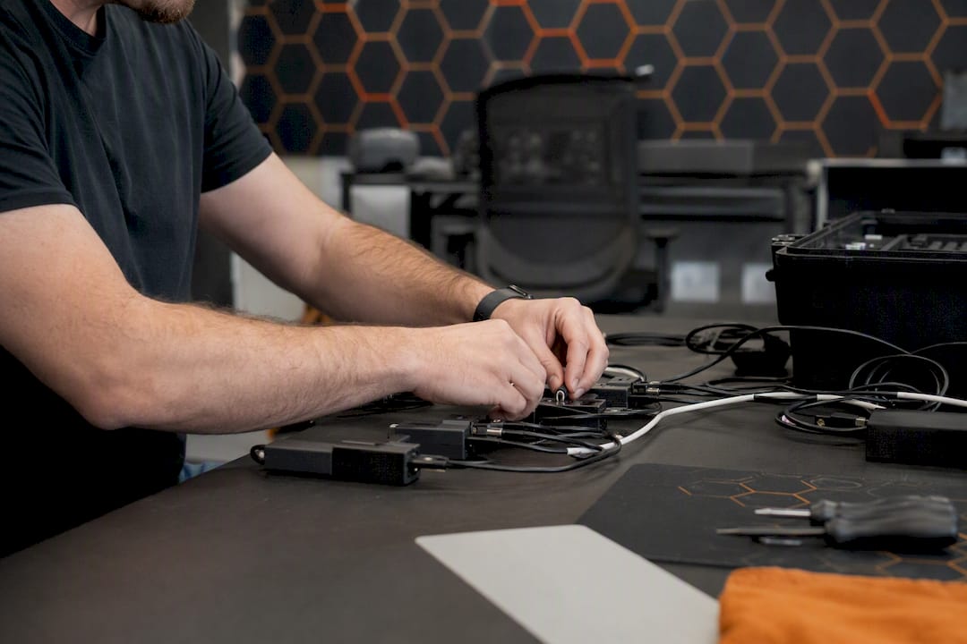 Hands configuring security hardware for multi-agent system